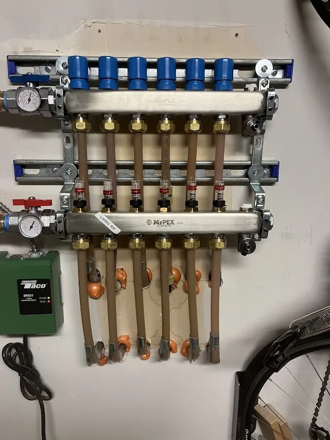 Plumber performing Water Heater Repair at a residential property in Maple Shade